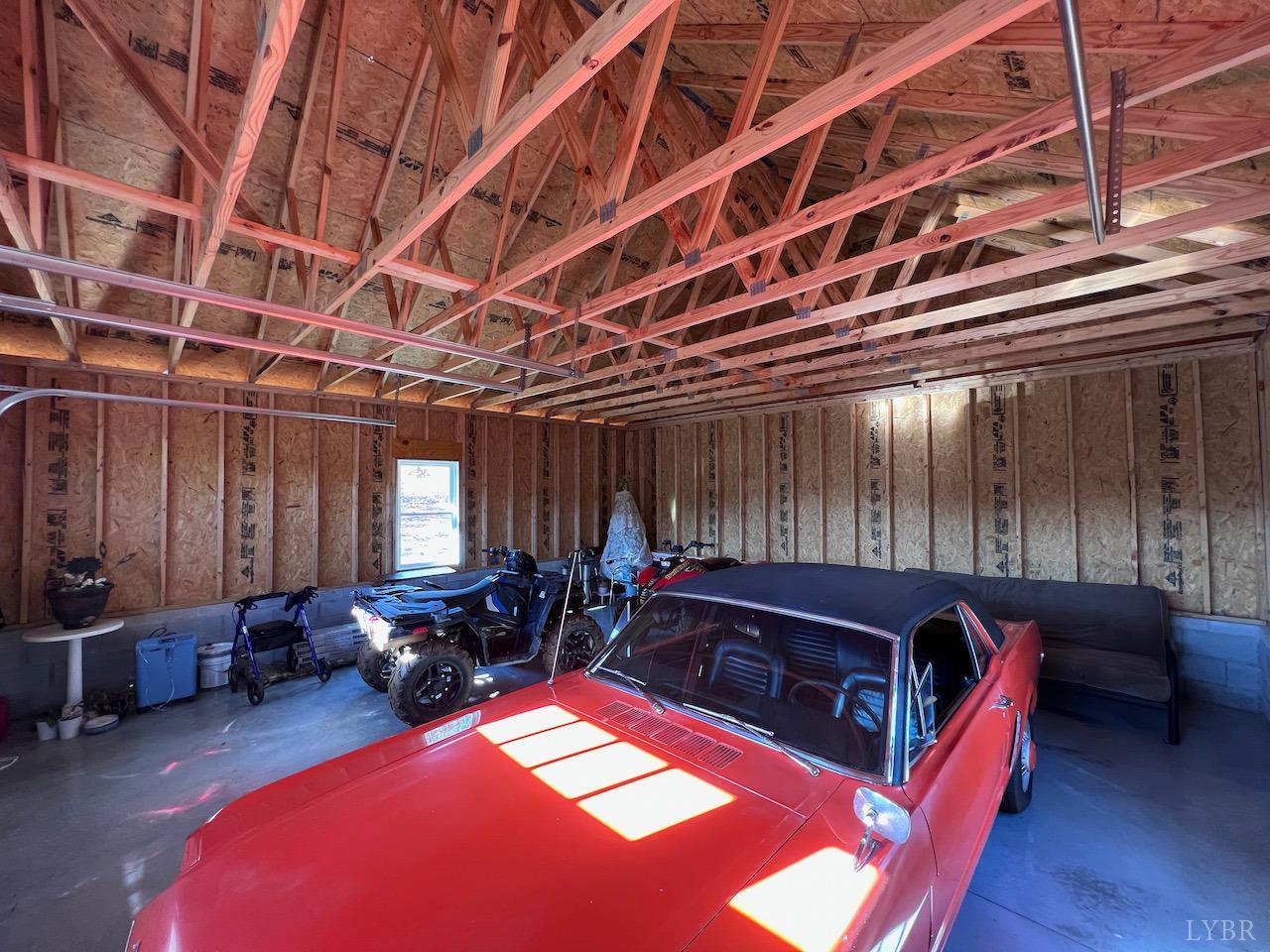 198 Oxford Furnace Road Lynchburg, VA 24504 - Photo 32 of 33 a living room with furniture a couch and a chandelier