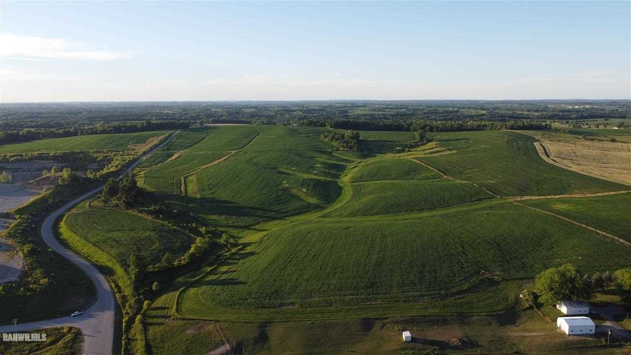 Tbd Quarry Road Mt Carroll, IL 61053 - Photo 1 of 10 an aerial view of a golf course with a lake view