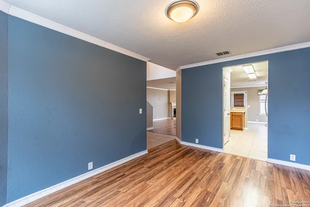 a view of a livingroom with wooden floor