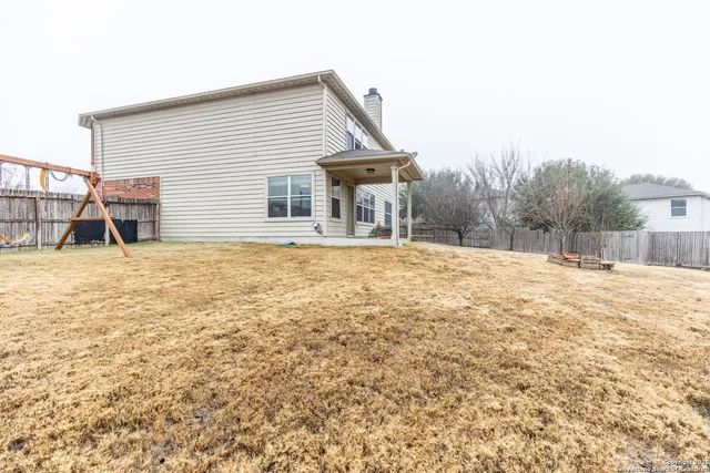 a picture of a bathroom with a shower