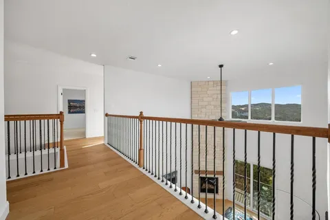 a spacious bathroom with a tub shower and couch