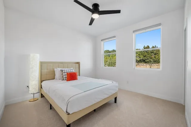 a bathroom with a shower and a sink