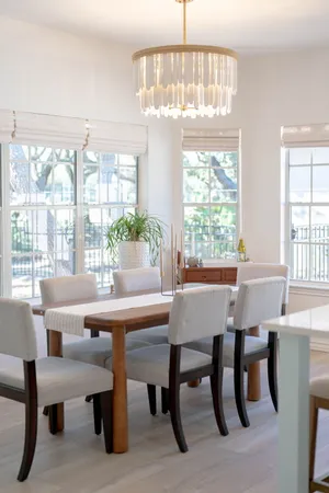 a living room with furniture fireplace and a window