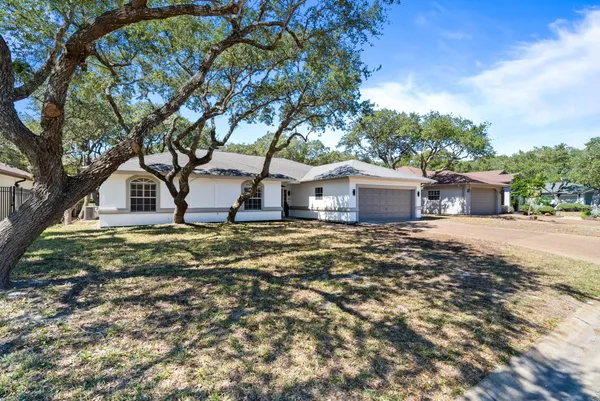 a view of house with tree s