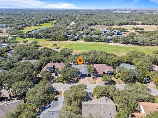 a view of outdoor space with deck and trees
