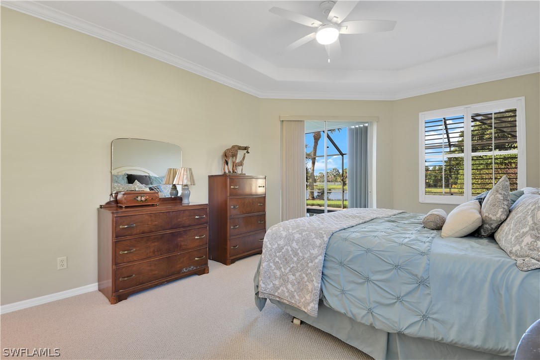 12834 Timber Ridge Drive Fort Myers, FL 33913 - Photo 12 of 31 a bedroom with a bed and a window