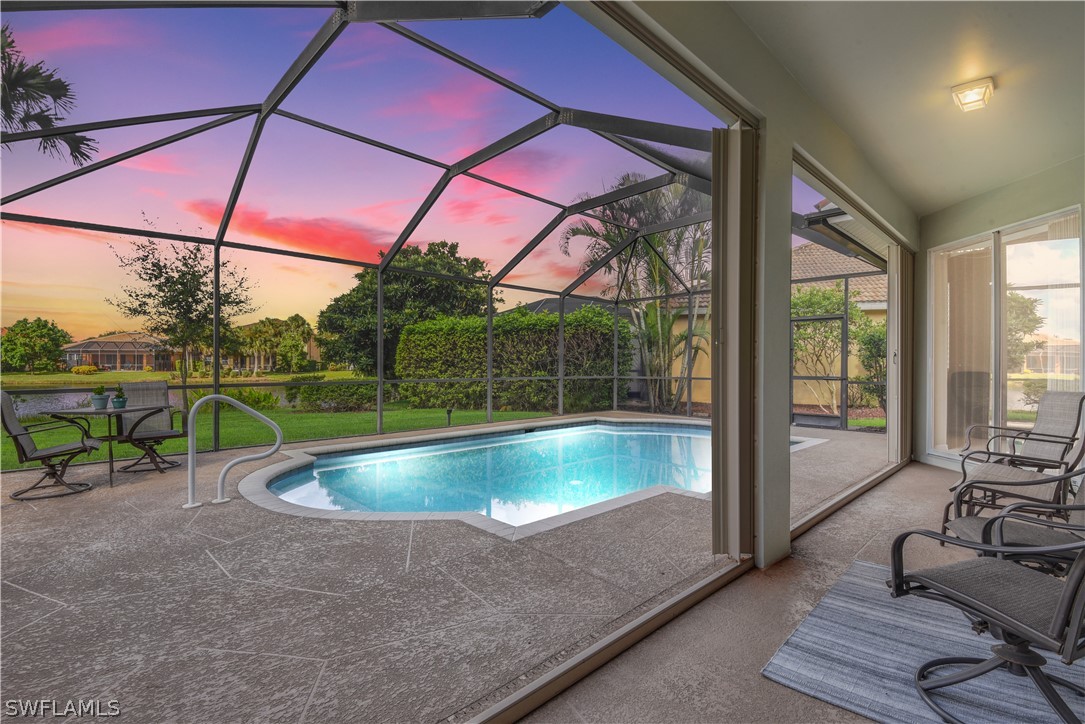 12834 Timber Ridge Drive Fort Myers, FL 33913 - Photo 2 of 31 a view of outdoor space with swimming pool and furniture