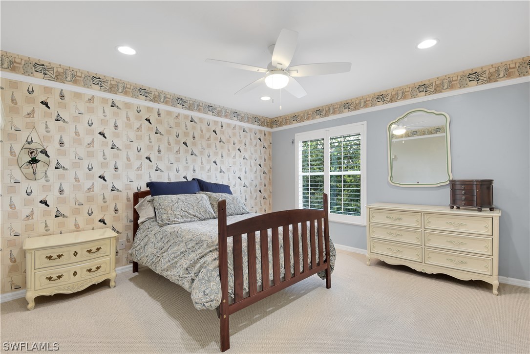 12834 Timber Ridge Drive Fort Myers, FL 33913 - Photo 21 of 31 a bedroom with a bed and a window
