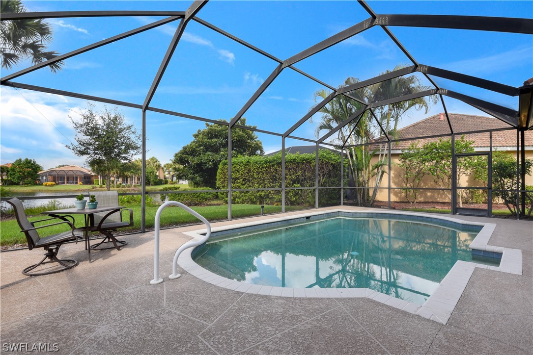 12834 Timber Ridge Drive Fort Myers, FL 33913 - Photo 31 of 31 a view of yard with swimming pool and outdoor seating