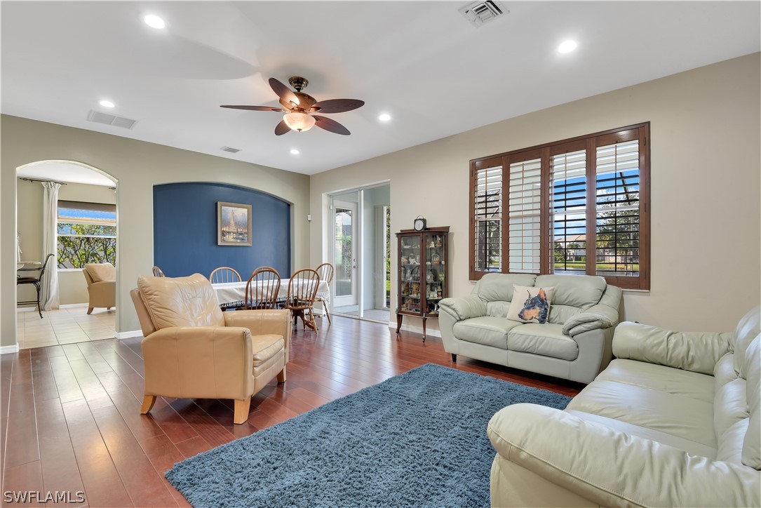 12834 Timber Ridge Drive Fort Myers, FL 33913 - Photo 4 of 31 a living room with furniture and a large window
