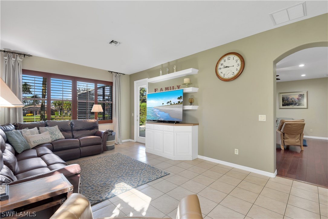 12834 Timber Ridge Drive Fort Myers, FL 33913 - Photo 7 of 31 a living room with furniture and a large window