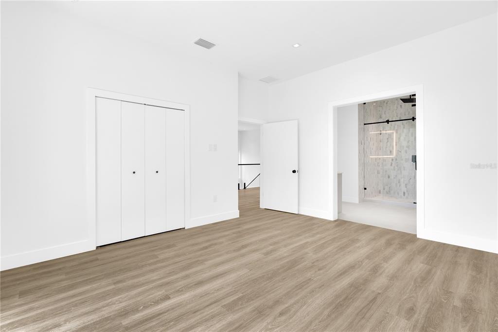 436 East 7th Avenue Windermere, FL 34786 - Photo 14 of 27 a view of an empty room with wooden floor