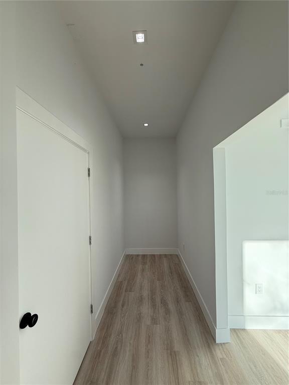 436 East 7th Avenue Windermere, FL 34786 - Photo 15 of 29 a view of a hallway with wooden floor