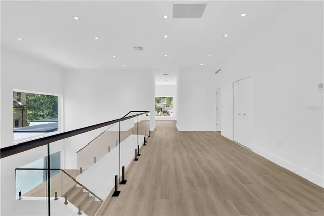 a view of entryway with wooden floor