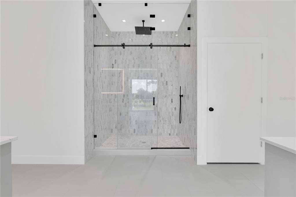 436 East 7th Avenue Windermere, FL 34786 - Photo 18 of 29 a bathroom with a shower