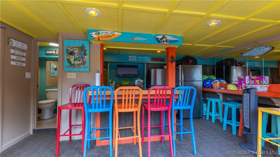 804 Manor Circle, Unit D Osage Beach, MO 65065 - Photo 18 of 34 bar in clubhouse