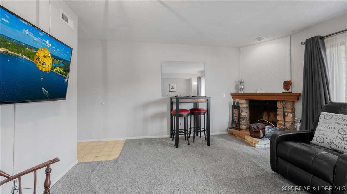 804 Manor Circle, Unit D Osage Beach, MO 65065 - Photo 6 of 34 wood burning fireplace