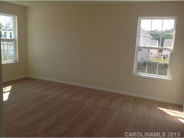 78174 Rillstone Drive, Unit 221 Lancaster, SC 29720 - Photo 9 of 16 an empty room with a window