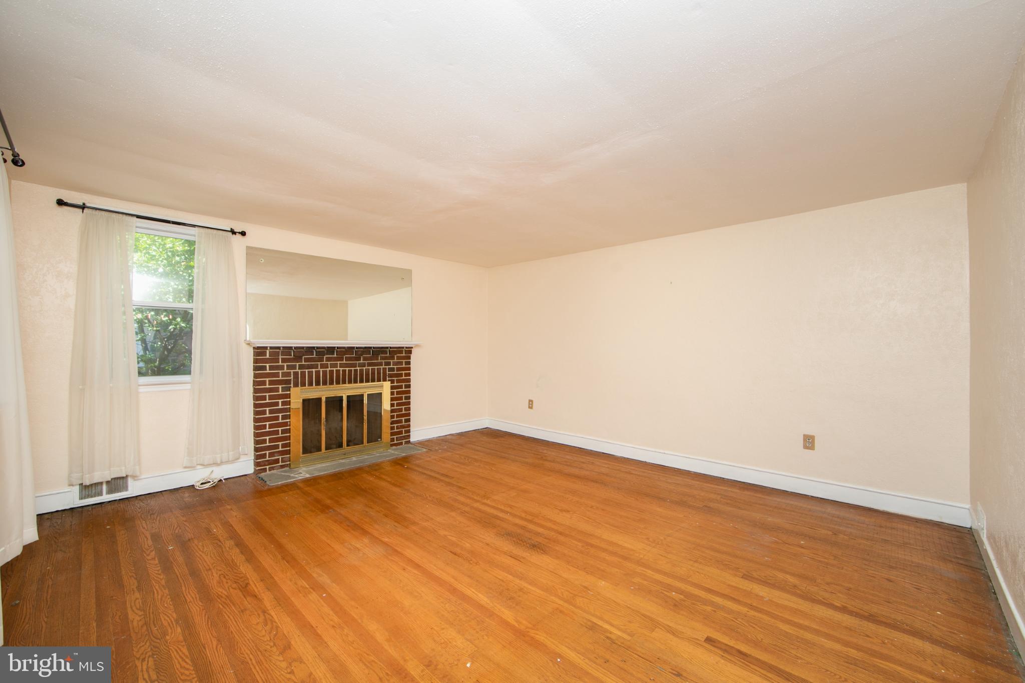 449 Hawarden Road Springfield, PA 19064 - Photo 12 of 60 Spacious living area with classic charm.