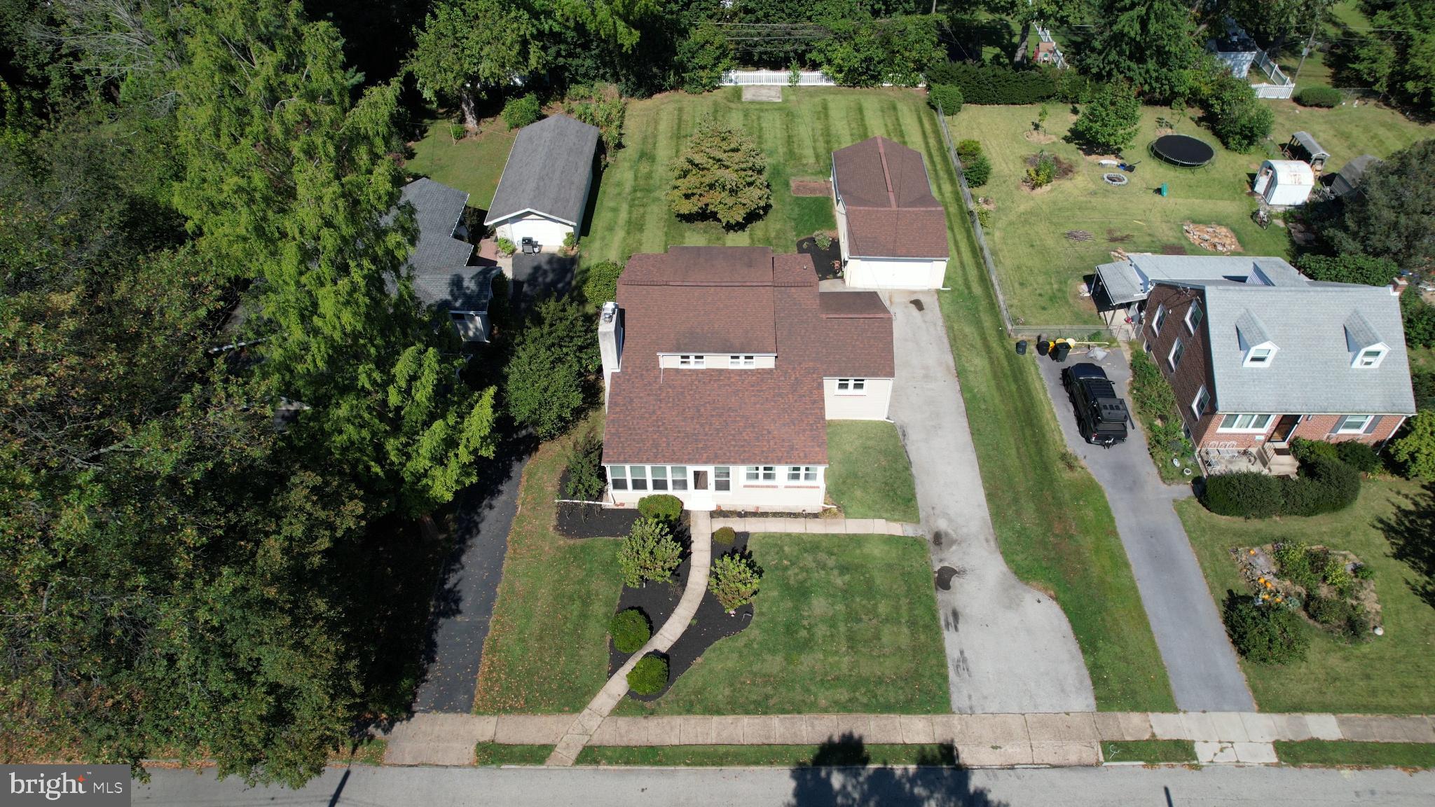 449 Hawarden Road Springfield, PA 19064 - Photo 2 of 60 Spacious property with lush green surroundings.
