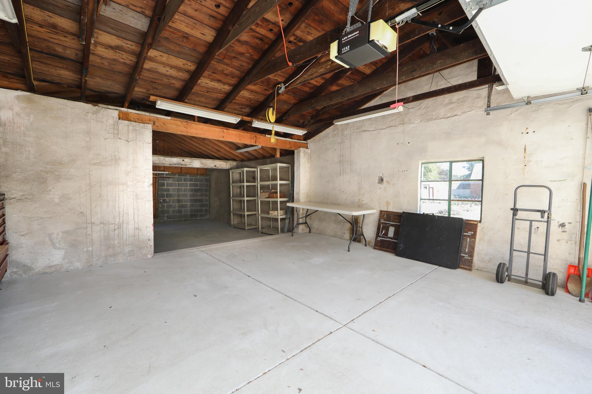 449 Hawarden Road Springfield, PA 19064 - Photo 47 of 60 Spacious garage with rustic charm.