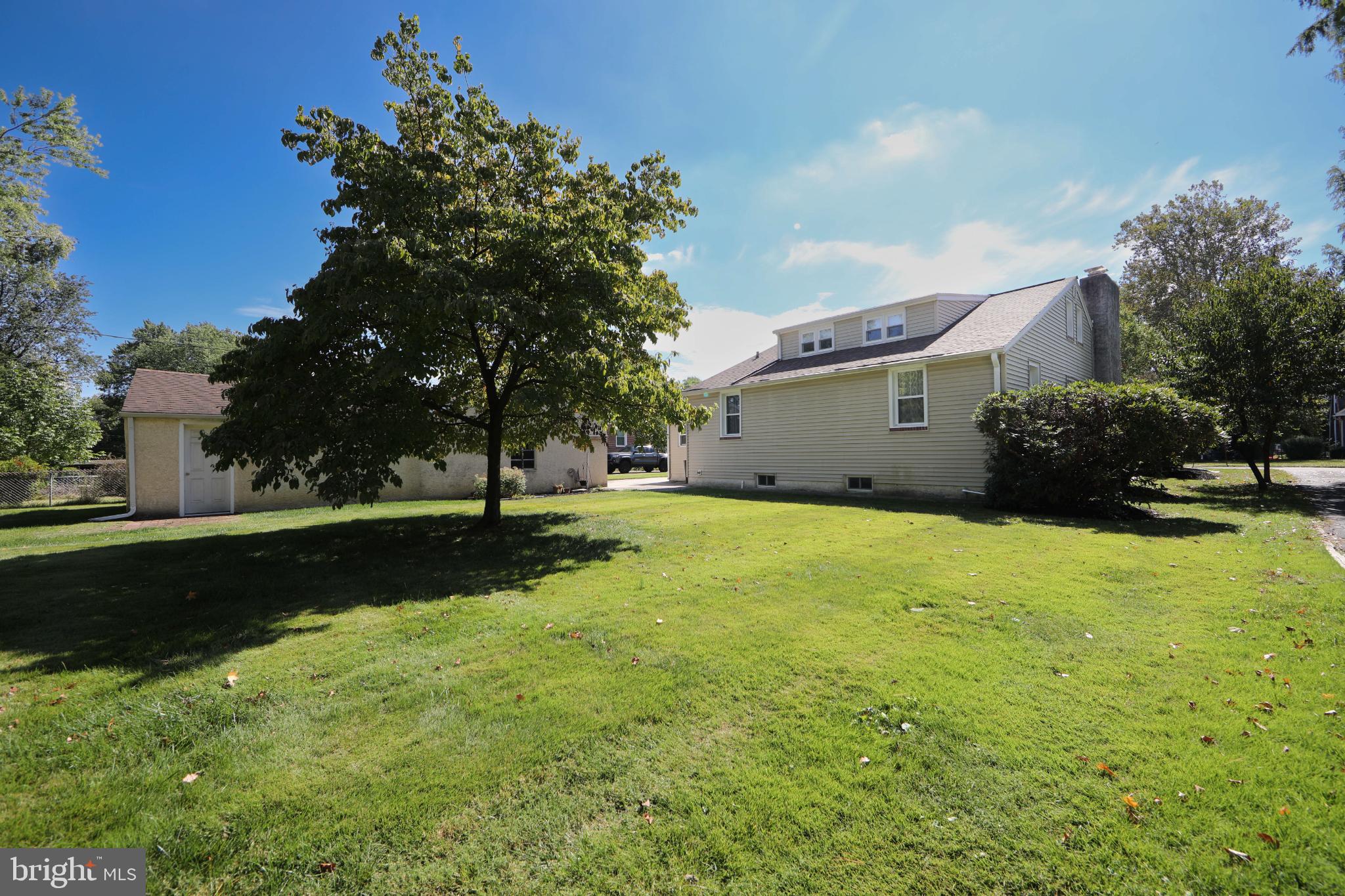 449 Hawarden Road Springfield, PA 19064 - Photo 50 of 60 Spacious yard with lush greenery and sunshine.