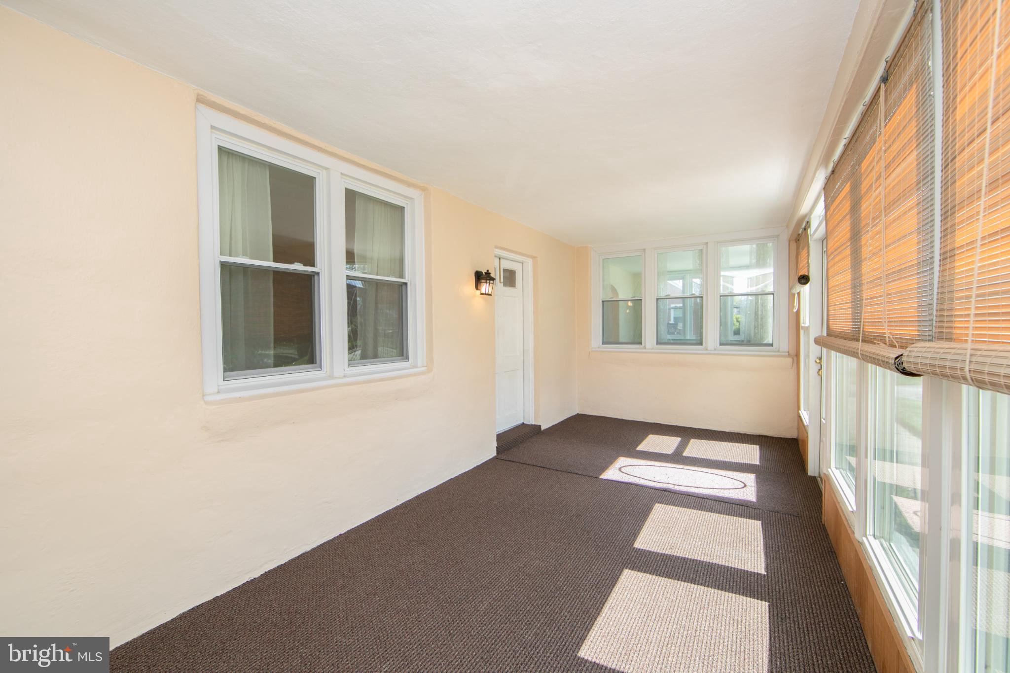 449 Hawarden Road Springfield, PA 19064 - Photo 10 of 60 Bright and airy sunroom with inviting light.
