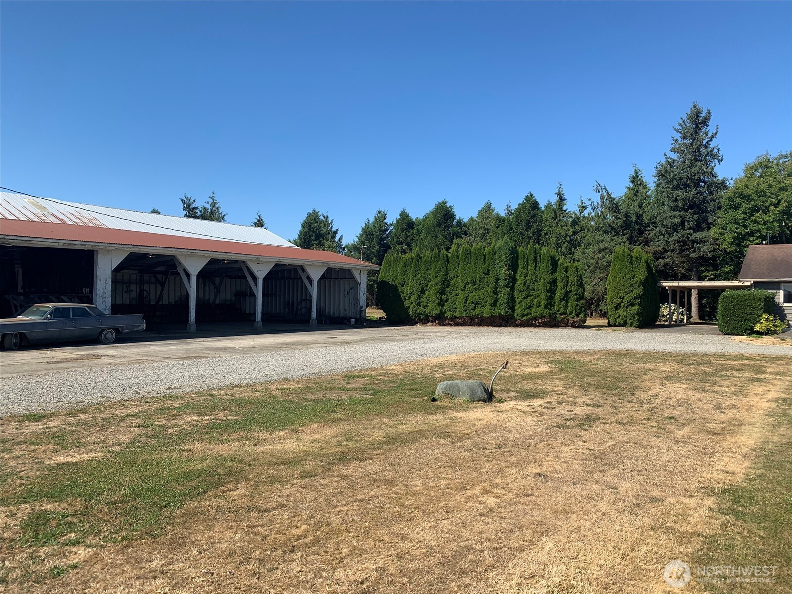 3037 Massey Road Everson, WA 98247 - Photo 16 of 28 a swimming pool with outdoor seating and yard