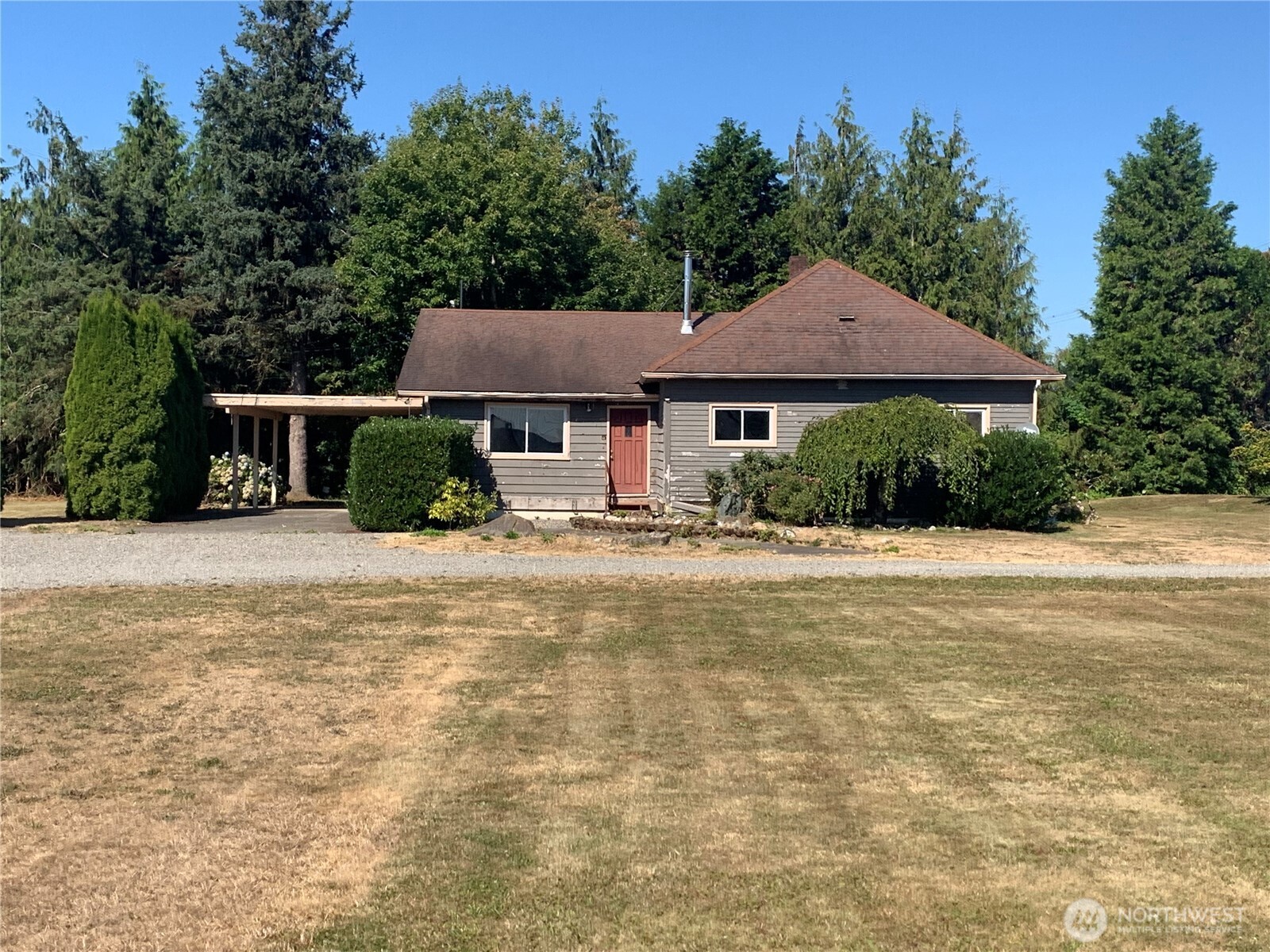 3037 Massey Road Everson, WA 98247 - Photo 2 of 28 a front view of a house with a yard