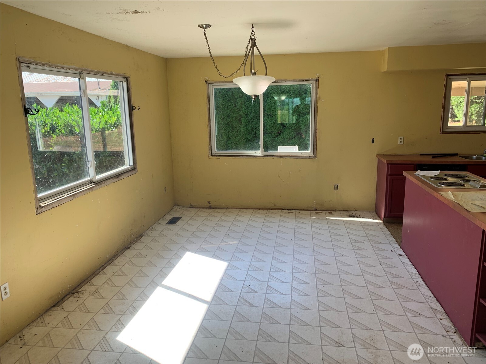 3037 Massey Road Everson, WA 98247 - Photo 6 of 28 a view of a kitchen with wooden floor and windows