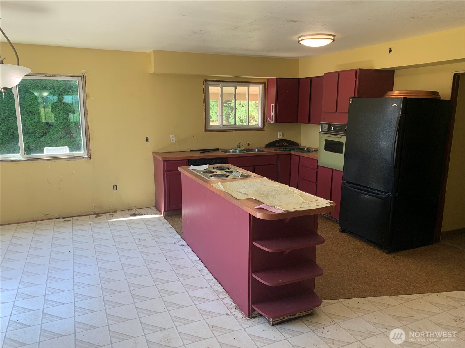 3037 Massey Road Everson, WA 98247 - Photo 7 of 28 a kitchen with stainless steel appliances granite countertop a stove a refrigerator and a sink
