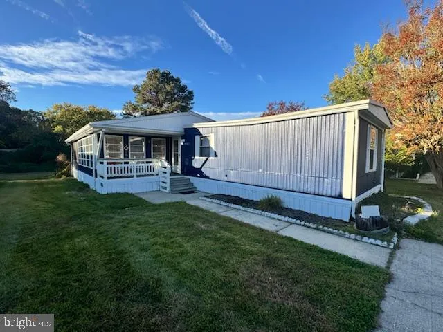 a view of a backyard with a garden