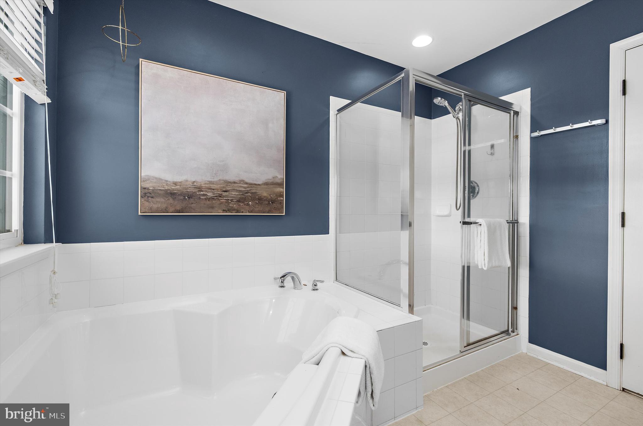 3115 Raking Leaf Drive Abingdon, MD 21009 - Photo 37 of 61 a bathroom with a bathtub and a shower