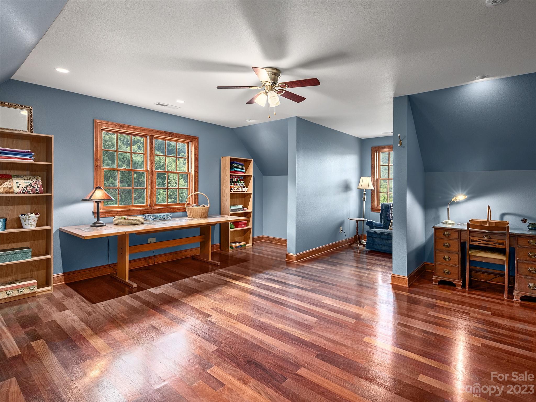 234 Arbor Ridge Clyde, NC 28721 - Photo 20 of 33 a reading room with furniture and wooden floor