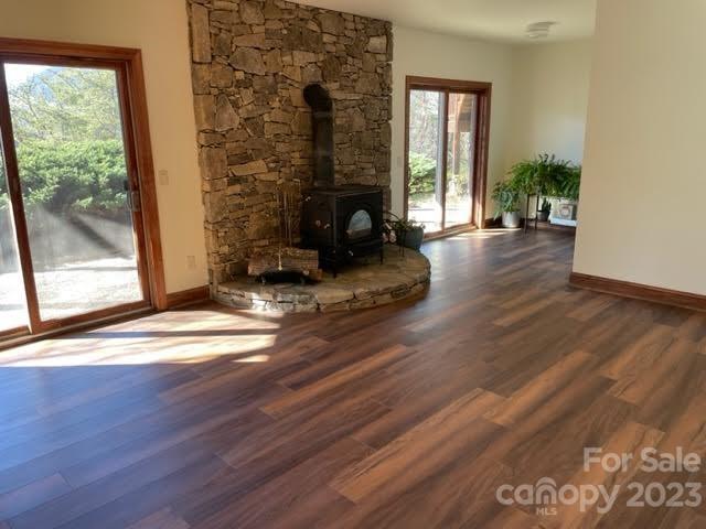 234 Arbor Ridge Clyde, NC 28721 - Photo 22 of 33 a living room with furniture and wooden floor