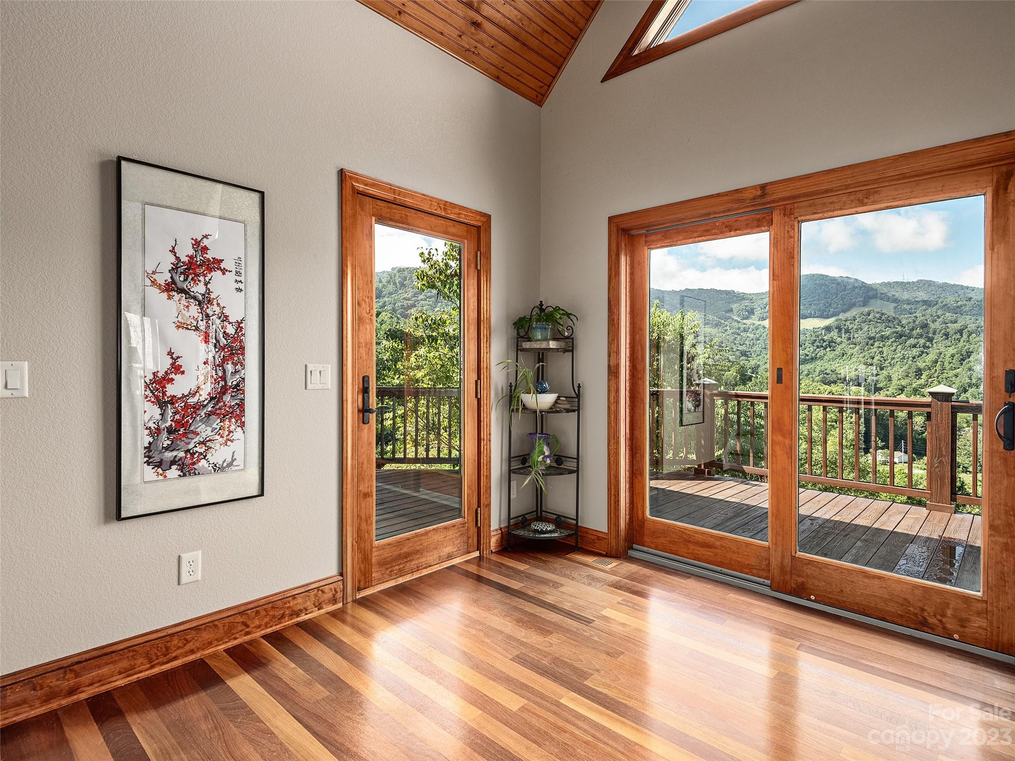 234 Arbor Ridge Clyde, NC 28721 - Photo 5 of 33 a view of an empty room with a window