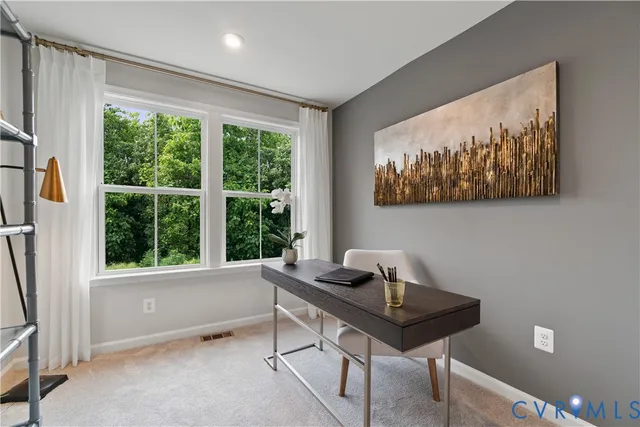 a room with furniture and a window