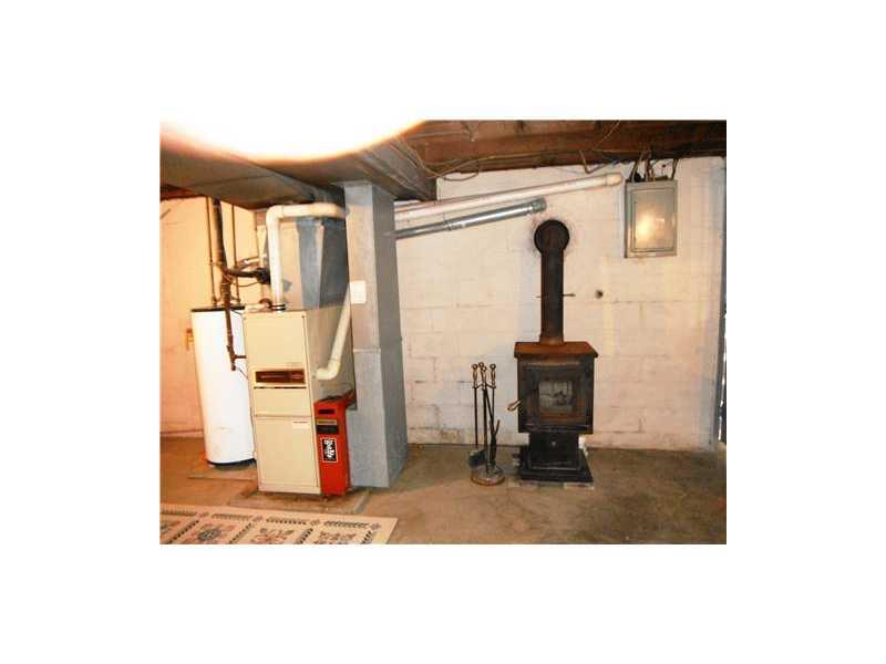 1588 Grange Road Charleroi, PA 15022 - Photo 14 of 18 Other. WOOD BURNING STOVE IN BASEMENT