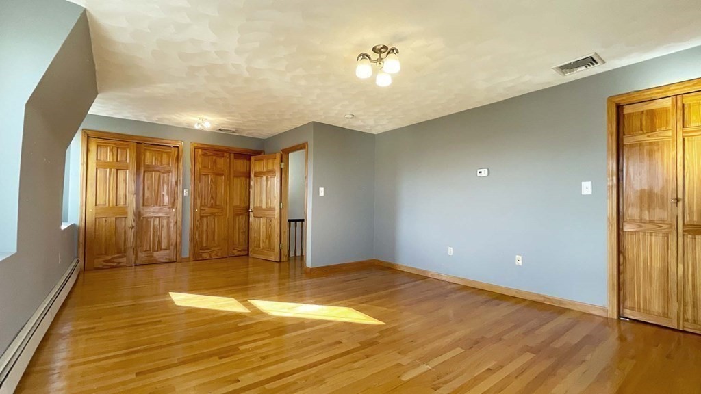 21 Parker Street Boston, MA 02129 - Photo 20 of 28 a view of an empty room with glass door