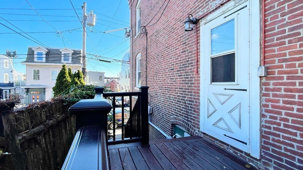 21 Parker Street Boston, MA 02129 - Photo 22 of 28 a balcony view with a seating space