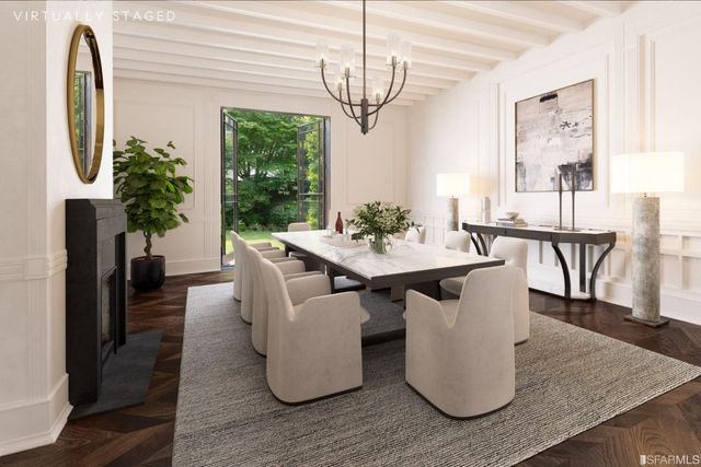 a dining room with furniture potted plants and wooden floor