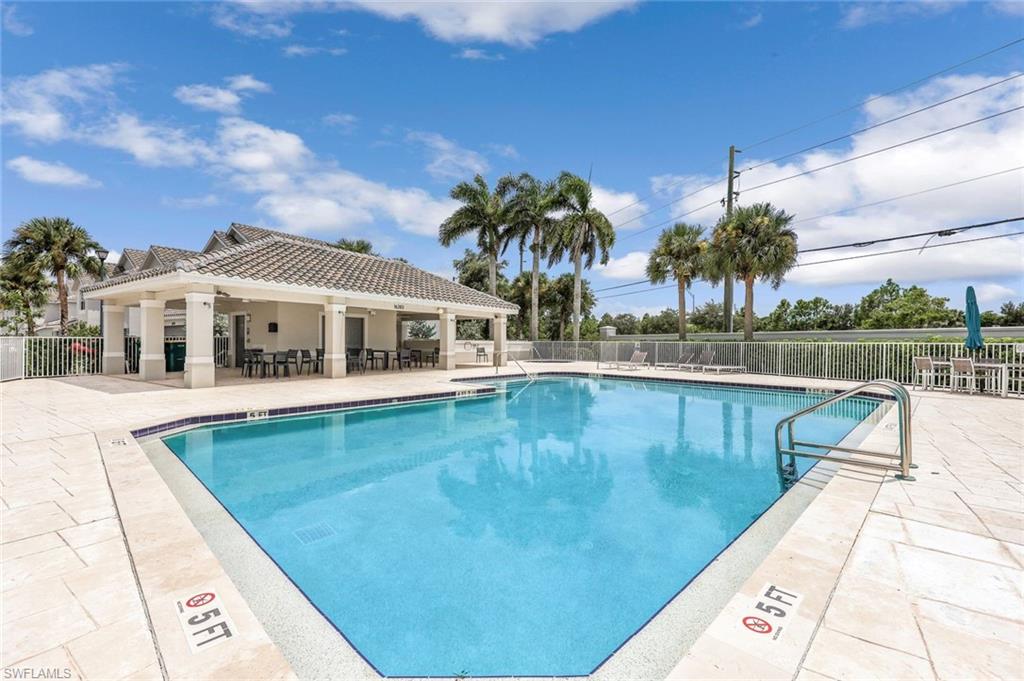 16162 Ravina Way, Unit 65 Naples, FL 34110 - Photo 22 of 22 a view of a house with swimming pool