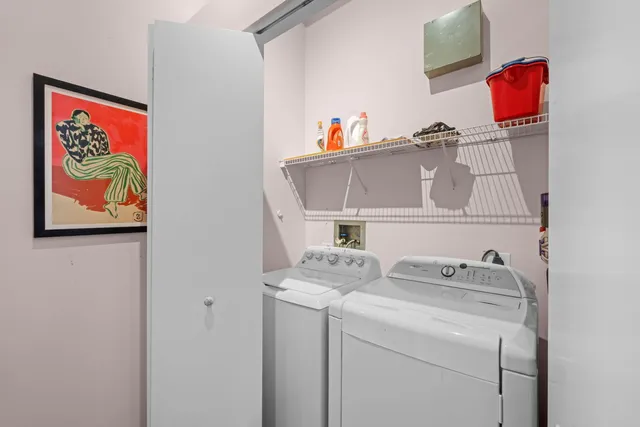 a room with a table and a mirror