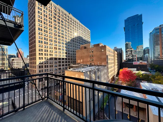 a view of city from a balcony