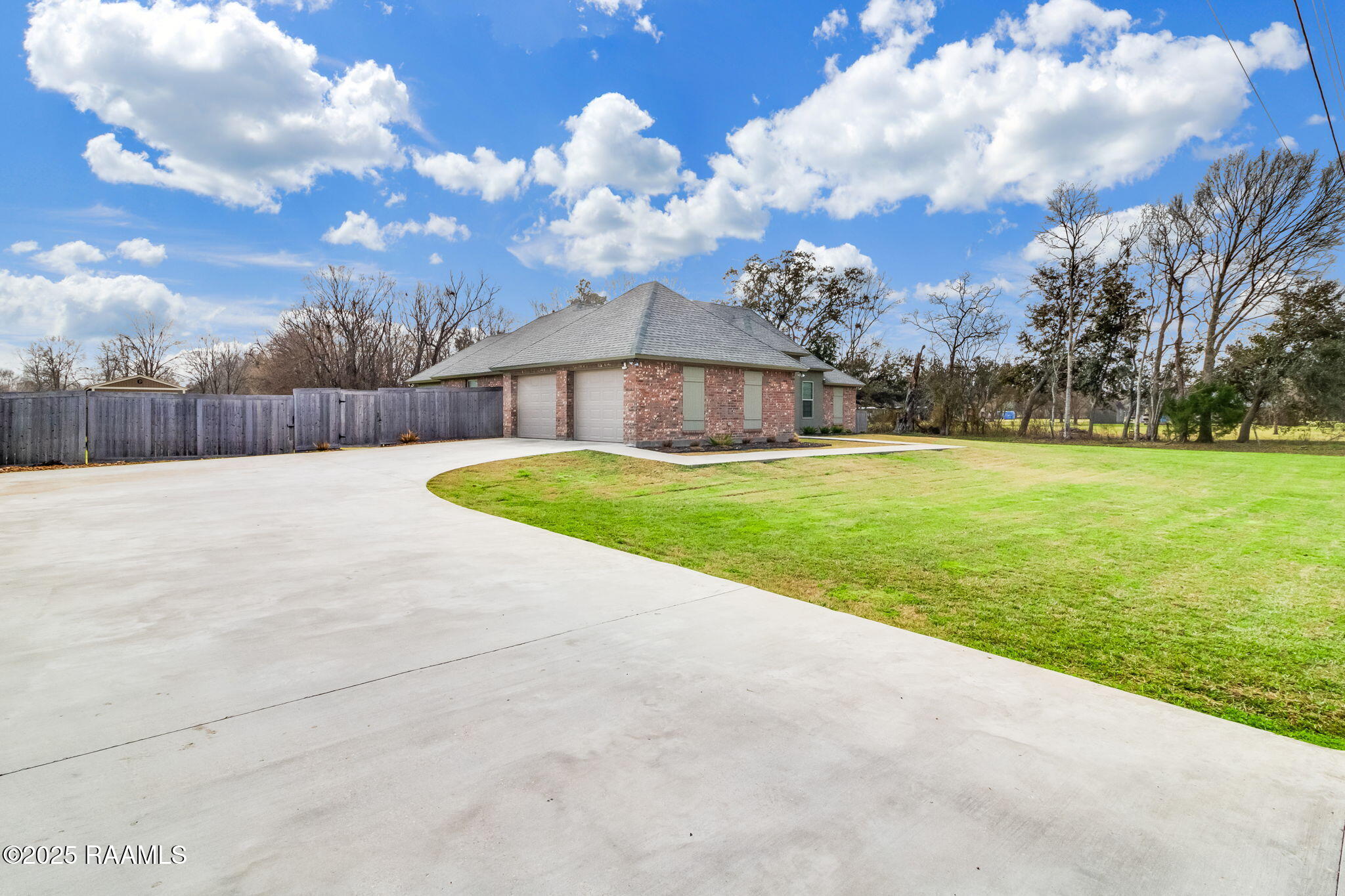 1274 Camp Bon Temps Road Breaux Bridge, LA 70517 - Photo 3 of 28 Long Driveway with 2 car garage