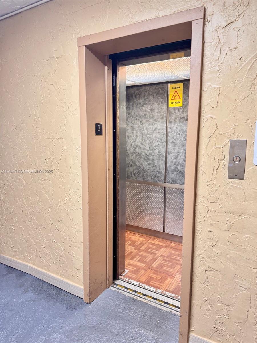 5201 Geneva Court, Unit 307 Doral, FL 33166 - Photo 15 of 19 a view of front door