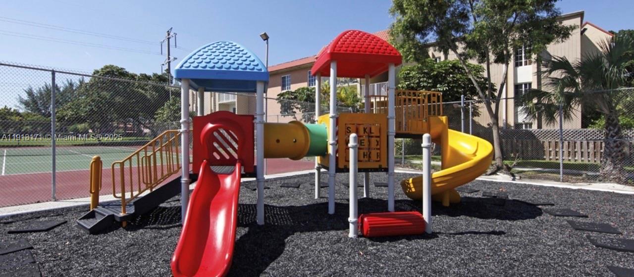5201 Geneva Court, Unit 307 Doral, FL 33166 - Photo 17 of 19 a view of a slide in a deck