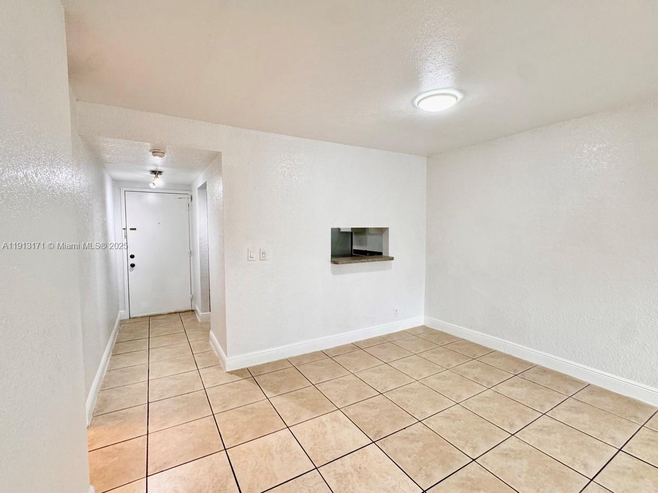 5201 Geneva Court, Unit 307 Doral, FL 33166 - Photo 6 of 19 a view of an empty room