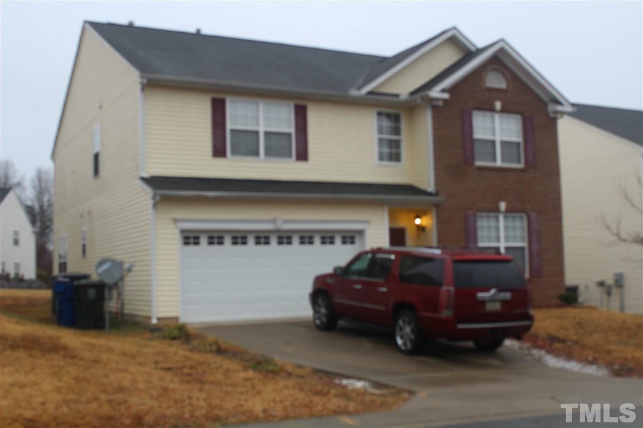 3339 Dutchman Road Raleigh, NC 27610 - Photo 1 of 4 a car parked in front of a house