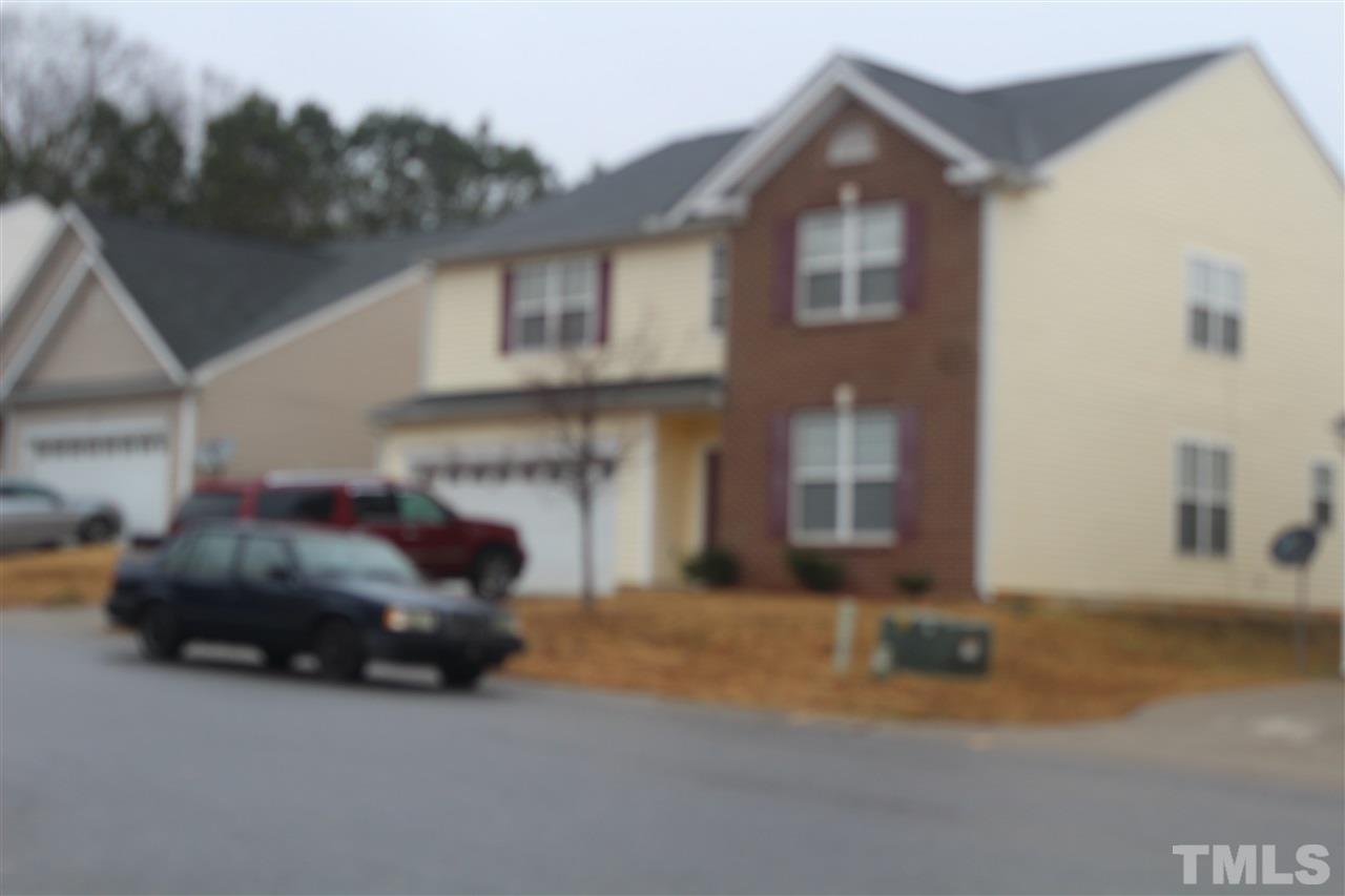 3339 Dutchman Road Raleigh, NC 27610 - Photo 2 of 4 a view of a car in front of a building